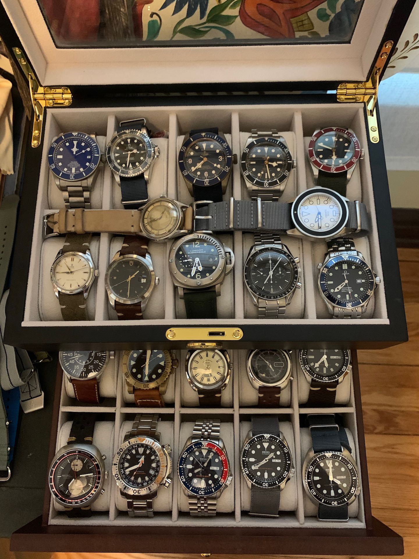 picture of my husband's watch collection